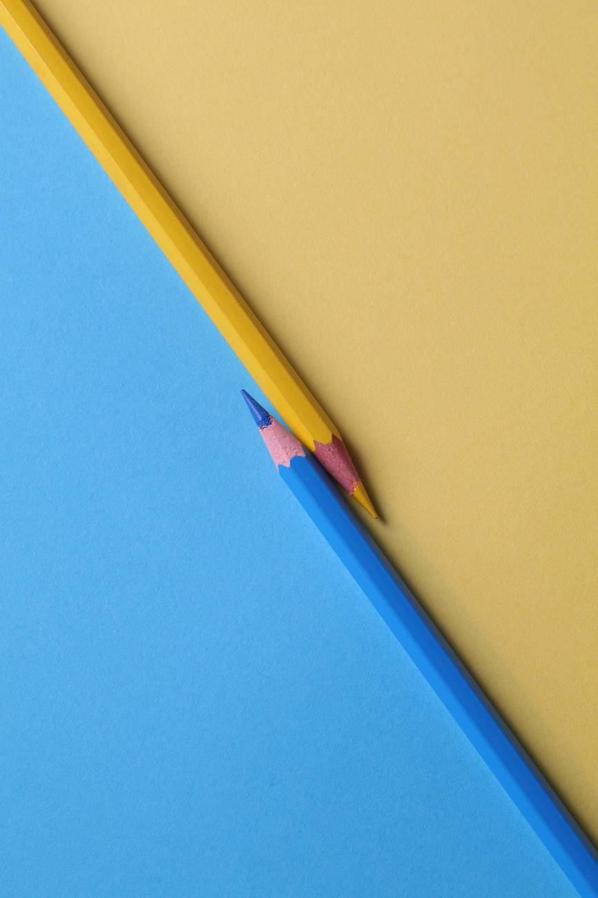 yellow and and blue colored pencils